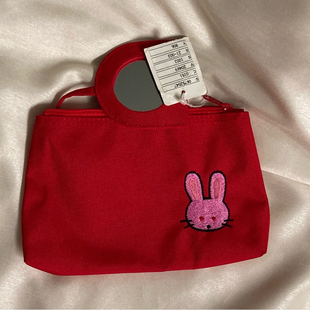 NWT Vintage Urban Outfitters cosmetics case with attached mirror.